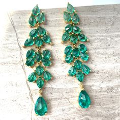 New~ Anthropologie Green Crystal Drop Chandelier Earrings Elegant And Classy, These Earrings Are Just Stunning! This Pair Of Emerald Green Earrings Feature Glittering, Faceted, Pear-Shaped Crystals. Secured With A Post Back, This Striking Pair Exudes Glamour And Sophistication. These Long, Linear Dramatic Statement Earrings Won't Go Unnoticed! Approx. 3"L, 3/4"W. 14k Gold Plated, Glass, Post Backs Included. Nwot Anthro, Boho, Free People, Dressy, Formal, Red Carpet, Angelina Jolie Emerald Green Green Chandelier Earrings For Party, Green Dangle Teardrop Earrings For Party, Green Dangle Chandelier Earrings For Anniversary, Green Teardrop Chandelier Earrings For Party, Angelina Jolie Emerald, Pearl Threader Earrings, Boho Free People, Drop Chandelier, Anthropologie Earrings