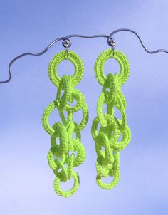 Discover the Fluo pendant earrings in neon green for the colour-blocking fanatic. They're lightweight and stylish, perfect attributes for choosing the perfect earring.

The authentic Fluo earrings are handmade with crocheted threads embellished with a sterling silver post.

They are a one-of-a-kind piece created according to the inspiration of the moment.

Colours may differ depending on your screen resolution. Green Crochet Jewelry, Bold Handmade Green Jewelry, Handmade Neon Yellow Jewelry For Summer, Handmade Neon Jewelry For Summer, Colorful Website, Colour Blocking, Textile Jewelry, Gift Card Sale, Pendant Earrings