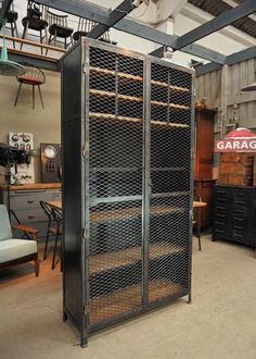 an old metal storage cabinet in a garage