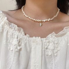 Sweet baroque pearl necklace At first sight, this baroque pearl choker can make people directly feel the meaning of sweet, delicate, and elegant. If you're looking for a real pearl necklace to go with your off-the-shoulder dress, square-neck tee, or anything without a collar, this is the right pearl necklace for women to wear. With a small but noticeable size, this 5-6mm baroque freshwater pearl necklace looks shiny and personal. The baroque pearl choker also comes with an eye-catching design: a Everyday Wear Jewelry, Natural Pearl Necklace, Moonstone Pendant Necklace, Real Pearl Necklace, White Pearl Necklace, Gemstone Beaded Necklace, Baroque Pearl Necklace, Freshwater Pearl Necklace, Moonstone Necklace