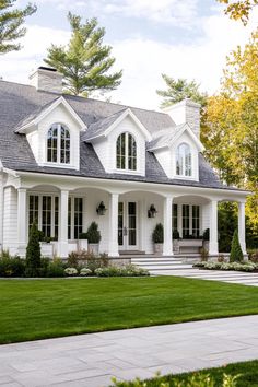 a large white house with lots of windows