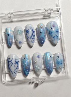 Dive into the Nostalgia with Our Y2K Blue Gel x Press On Nails!  #y2knailideas Winter Nail Gel Ideas, Alomd Nails Cute Summer, Korean Acrylic Nails Art Designs, Dark Blue Y2k Nails, Basic Nails Blue, Liquid Gel Nails Designs, Blue Christmas Nail Art, Gloomy Nails, Pale Blue Nails With Design