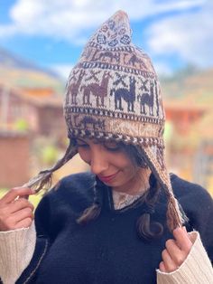 Andean alpaca wool beanie. This beautiful beanie is made by Hilaria from the Chahuaytire community, a part of the Quechua people living in the Sacred Valley of the Inka's in the Peruvian Andes.  ⛰️Chahuaytire community is known to be the best weavers among the Quechua people.  They maintain their ancestral knowledge of plants and weaving and bring it to the present.  🧵🦙They are involved in every part of making their products.  They have their own alpaca and lamas which they take care of, and obtain their wool out of. They make their own natural dies from indigenous plants belonging to their region.  🫶🏼They have a strong connection with nature and all of their designs are a reflection of the nature, The beanie has a very smooth soft feeling. It is not itchy like sheep wool. Adjustable Alpaca Hat For Outdoor, Bohemian Brown Wool Hat, Alpaca Hat For Outdoor Winter Use, Winter Outdoor Alpaca Hat, Alpaca Beanie For Outdoor, Cozy Alpaca Hats For Fall, Outdoor Alpaca Beanie Hat, Winter Alpaca Beanie Hat, Alpaca Winter Hat For Cold Weather