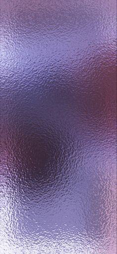 an abstract purple and pink background with some water droplets on it's glass surface