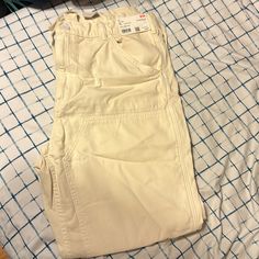 Nwt Uniqlo Off White Utility Work Pants (Waist 36-39in) Never Worn, Wrinkled Due To Storage White Utility Trousers, White Tapered Leg Cargo Pants For Spring, White Wide Leg Utility Pants, White Relaxed Fit Utility Pants, White High Waist Utility Bottoms, White Tapered Leg Work Pants With Pockets, White High Waist Utility Pants, High Waist White Utility Pants, White Straight Leg Work Pants For Spring