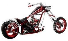 a red and black motorcycle is shown on a white background in this image it appears to be an art work