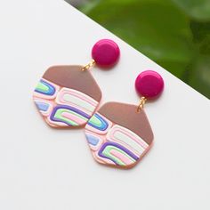 Kindly check out the Dangle earrings section, where you can find more unique designs!  https://www.etsy.com/shop/VelvetVineEarrings?ref=seller-platform-mcnav&section_id=50500551 keywords: Unique Resin purple pink earrings dangles/Geometric earrings/Pink hexagon dangle earrings/vivid purple holiday earrings/handmade original 👄Item details:  Originally designed by me and crafted in our Denver, Colorado studio, our family business thrives with the invaluable contributions of my brother and cousin, who play key roles in creating our items and maintaining our Etsy shop. Specifications: *Length: 40mm *Width: 25mm *Materials: real flowers and resin, stainless steel  Shipping: *Ships within 7 days from Denver, with free domestic and international shipping. Returns and Cancellations: *Accepted, wi Holiday Earrings, Holiday Earring, Earrings Pink, Pink Earrings, Geometric Earrings, Denver Colorado, Real Flowers, Earrings Handmade, Minimalist Fashion