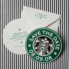 an envelope with a starbucks sticker on it next to a cup of coffee and some paper