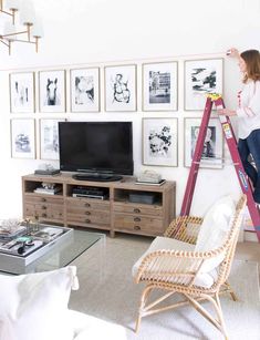 using laser level to hang art above TV Beach House Tv Wall, Tv Area Design, Grid Gallery Wall, Tv Area, Christmas House Tour, New Kitchen Gadgets, Best White Paint