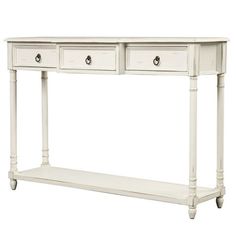 a white console table with two drawers