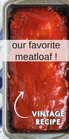 an old fashioned meatloaf in a metal pan with the words our favorite meatloaf