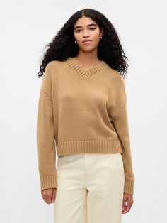 Oversized V-Neck Sweater Oversized V-neck Sweater With Ribbed Cuffs, Gap Relaxed Fit Sweatshirt For Fall, Gap V-neck Fall Sweater, Gap V-neck Tops For Fall, Casual Gap V-neck Sweater, Casual V-neck Sweater By Gap, Gap Crew Neck Sweater For Fall, Gap Cotton Sweater With Relaxed Fit, Classic Oversized V-neck Sweater