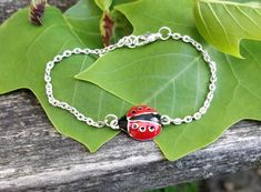 Ladybug Bracelet. Anniversary Gift, Birthday Gift, Bug Bracelet. Ladybug Jewelry. Gift For Mom by TreeTownPaper on Etsy Silver Novelty Charm Bracelet For Birthday, Red Novelty Jewelry For Birthday, Adjustable Nickel-free Red Charm Bracelet, Red Nickel-free Charm Bracelet For Gift, Red Nickel-free Charm Bracelet As Gift, Bug Bracelet, Ladybug Bracelet, Ladybug Jewelry, Black Ladybug