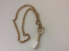 "Matte gold faux pearl, drop dangle khaki cabochon necklace, probably unmarked Anne Klein Pendant drop - 3\", necklace 25.25\" with clasp, chain width - 6mm. Very good to excellent condition. Unmarked" Gold Pendant Chain Necklace With Pearl Drop, Gold-tone Jewelry With Pearl Charm For Formal Occasions, Formal Gold-tone Jewelry With Pearl Charm, Elegant Gold-tone Dangle Necklaces, Gold-tone Metal Jewelry With Pearl Charm, Vintage Gold Pearl Necklace With Pearl Drop, Vintage Gold Pearl Drop Necklace, Formal Pearl Charm Brass Jewelry, Vintage Metal Necklace With Pearl Charm