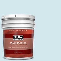 the behr ultra paint and primer in one is shown on a green background