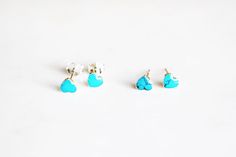 "Dainty, minimalist, trendy everyday earrings. DESIGN: Heart MATERIALS: Metal: Sterling Silver Stone: Reconstructed turquoise (sky blue) Others: Resin DETAILS: Width: 5mm Height: 5mm Setting: Bezel Earring type: Push back Please take note that, Sterling Silver is hypoallergenic, but if you have high sensitivity, please message me, before purchasing any sterling silver earrings. ----------------------------------------------------------------------------------------------------------------------- Minimalist Turquoise Earrings For Everyday, Dainty Turquoise Earrings For Gift, Blue Heart-shaped Sterling Silver Earrings, Mini Earrings Stud Teal, Unique Sapphire Rings, Turquoise Stud Earrings Mini Silver, Moissanite Engagement Ring Cushion Cut, 14k Gold Wedding Ring, Bezel Earrings