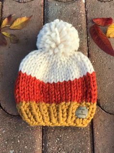 Hand knit candy corn theme baby beanie! Perfect for the October gift for new Mommy, baby shower, or your new little one! Can be used for either girl or boy! Perfect photo prop! *Best to hand wash and lay flat to dry to keep looking the nicest.  * message me if looking for other colors for gift ideas! Candy Corn Costume, October Gifts, Baby First Halloween, Newborn Baby Hats, Baby Trend, Baby Hats Knitting, Newborn Hat, Winter Baby, Fall Baby