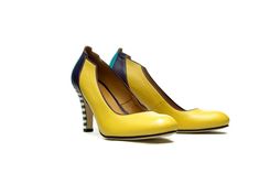 Sophisticated women's yellow handmade leather pumps. With rounded toe they are perfectly comfortable and made from subtle Italian leather from sole to upper, these shoes are the most refined way to make your outfit pop from suiting to cocktail wear. Beautiful colors and black and white striped heels will add a hit off pretty pattern to any look whatever the hour. DETAILS: Full leather upper, lining and sole Calf and sheep leather Covered heel measures approximately 85 mm/ 3.3 Inches Low cut vamp Modern Yellow Heels With Sculpted Heel, Yellow Closed Toe Heels For Formal Occasions, Yellow Spring Heels For Office, Modern Yellow Heels For Evening, Yellow Round Toe Heels For Office, Yellow Almond Toe Heels With Leather Sole, Yellow High Heels With Sculpted Heel, Yellow Almond Toe Court Shoes For Spring, Elegant Yellow Court Shoes With 4-inch Heel