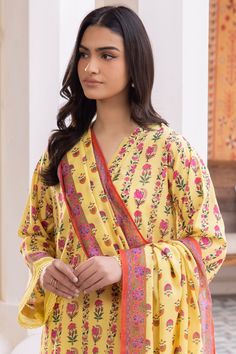 Zellburry Shirt Shalwar Dupatta - 1065 Essential Summer Lawn Collection 2024 Original brand suit fabric and photography lite diffrance in actual print. Floral Print Top For Eid, Traditional Printed Yellow Tops, Yellow Festive V-neck Sets, Festive Yellow V-neck Set, Traditional Floral Print Tops For Eid, Festive Cotton Blouse With Dupatta, Festive Eid Tops With Printed Motifs, Festive Yellow Cotton Top, Yellow Cotton Sets With Printed Motifs