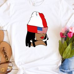 July 4th shirt for black women. Patriotic T-shirt For Independence Day, Red Flag Print T-shirt, Casual Black Shirt With American Flag Print, Casual 4th Of July Streetwear Shirt, White Independence Day Streetwear Top, Casual Shirt For 4th Of July Streetwear, Casual Flag Print Top For Fans, White Top For Independence Day Streetwear, Casual Streetwear Shirt For 4th Of July