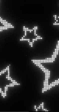 several white stars are shown in the dark