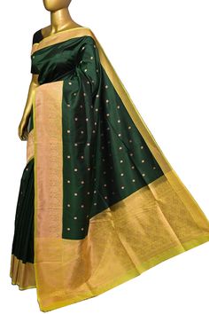 A luxury collection with fine traditional zari weaving on the body that comes with paisley style copper zari buti work and kadhua work on the pallu and with a yellow border with traditional zari work that makes this saree one of the magnetic works in a bottle green color. Color: A shade of bottle green color Technique: Amazing work of copper zari motif work on the body with traditional weaving on the rest of the saree Fabric: Katan Quality: Indyvogue's Assurance of Pure Silk Mark Certified Saree Yellow Border, Paisley Fashion, Color Techniques, Work Online, Traditional Weaving, Zari Work, Work Sarees, Banarasi Saree, Designer Blouse