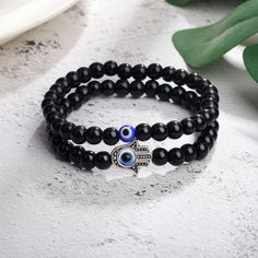 This beautiful 6cm Black Glass White Turquoise Colored Glaze Beaded Devil's Eye Bracelet Set is the perfect gift for your special someone. This gorgeous set includes a beaded bracelet made with natural black glass and white turquoise beads, perfect for any occasion. The unique design is a statement piece that adds an elegant touch to any outfit. Not only that, but this minimalist bracelet is highly customizable, making it the perfect gift for a girlfriend, wife, daughter, mother, sister, aunt, o Bridesmaid Gifts Unique, Turquoise Glaze, Devil Eye, Rope Jewelry, Matte Red, Color Glaze, Turquoise Glass, Blue Evil Eye, White Turquoise