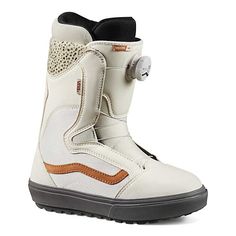 the snowboard boots are white and brown