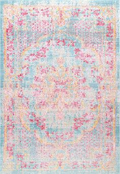 a blue, yellow and pink area rug with an ornate design on the bottom corner