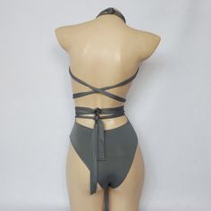 Material: Acrylic, Cotton, PolyesterSupport Type: Wire FreeWith Pad: No Fitted Backless Bodysuit For Beach Season, Fitted Backless Bodysuit For Beachwear, Fitted Backless Beachwear Bodysuit, Sleeveless Stretch Bodysuit With Tie Back, High Stretch Summer One-piece Bodysuit, Backless Stretch One-piece For Summer, Party Swimwear With Tie Back And Stretch, Stretch Backless Summer Bodysuit, Summer Stretch Backless Bodysuit