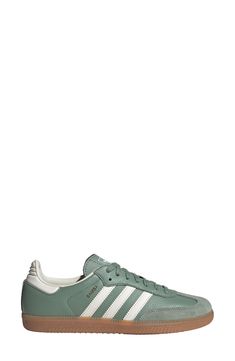 From the soccer pitch to the streets, this always-original sneaker maintains its legacy with luxe leathers and iconic 3-Stripes at the sides. Leather upper/textile lining/synthetic sole Imported Green Adidas Sneakers With Three Stripes, Leather Sneakers With White Sole And Three Stripes, Classic Leather Sneakers With Three Stripes, Soccer Pitch, Adidas Samba Sneakers, Adidas Samba, The Streets, Womens Sneakers, Chalk