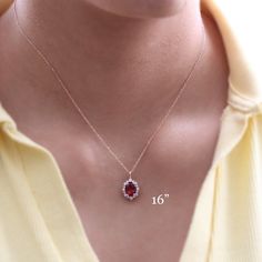 This timelessly elegant oval ruby necklace is set in the lustrous 14k gold tiara halo diamond drop pendant featuring an oval-shaped vivid red ruby surrounded by brilliant white diamonds that dangle beautifully from a solid gold cable chain. The length of the gold chain can be adjusted to either 16" or 18" long to suit your style! This ruby and diamond necklace can be crafted in your choice of white, rose, or yellow gold. ** The listing price is for one necklace only Availability: Ready to Ship: Oval Ruby Jewelry With Halo, Oval Ruby Halo Jewelry, Elegant Red Oval Pendant Jewelry, Fine Ruby Jewelry With Halo Detail, Fine Ruby Jewelry With Halo, Formal Ruby Necklace With Halo Setting, Fine Jewelry Ruby Halo, Elegant Ruby Necklace With Halo Setting, Elegant Jewelry With Halo Design And Lab-created Ruby