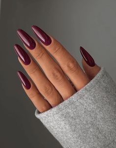 Are you looking for chic nail polish colors to wear this winter? Check out this guide to 11 luxurious dark shades and 45 nail designs as inspiration, perfect for the colder months. Burgundy, navy, charcoal and more deep hues are featured along with tips for wearing each color. winter nails, winter nail colors, dark nail polish colors, burgundy nails, navy nails, charcoal nails, winter manicure guide, winter nail art ideas, winter nail designs, winter nail trends 2023, cozy nail colors Purple Nails One Color, Nails Inspiration Fall 2022, Fall Nails Colors 2022, Pink Fall Nails 2022, Trending Acrylic Nails 2022 Fall, Trending Nails 2022 Fall, Trendy Nails Fall 2022, Trending Acrylic Nails Winter, Nails November 2022