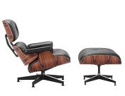 an eames chair and ottoman with black leather upholstered on the backrest