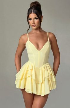 Veena Playsuit - Lemon Glamorous Cheap Mini Dress, Luxury Mini Dress For Summer, Luxury Chic Mini Dress For Brunch, Cute Cheap Yellow Mini Dress, Luxury Summer Mini Dress For Wedding Guest, Luxury Ruffled Mini Dress For Summer, Luxury Ruffle Mini Dress For Summer, Luxury Retro Mini Dress For Summer, Luxury Mini Dress With Folds For Summer