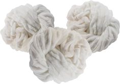 three balls of white yarn on a white background