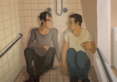 two men sitting in a bathroom next to each other