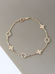 NOT GOLD PLATED, NOT GOLD FILLED! All our jewelry are stamped with a gold hallmark to certify the metal purity of the item. Product Details ☑14K SOLID GOLD ☑FLORAL: 6.6MM ☑CHAIN LENGTH: 15.5+1.5CM EXTENSION CHAIN 💓Tarnish resistant and sweat resistant  💓Hypoallergenic, made without lead, nickel and cadmium Gold Information *9K gold is 9 parts pure gold or 37.5% pure. *10K gold is 10 parts pure gold or 41.7% pure. *14K gold is 14 parts pure gold or 58.5% pure. *18K gold is 18 parts pure gold or Dainty Yellow Gold Bracelet With Flower Charm, Gold Bracelet With Flower Charm And Round Shape, Gold Bracelet With Flower Charm, Gold Bracelets With Flower Charm For Wedding, Delicate Gold Bracelets With Flower Charm, Delicate Gold Bracelet With Flower Charm, Gold Wedding Bracelets With Flower Charm, Dainty Gold Flower Chain Bracelet, Gold Flower Charm Bracelet For Weddings