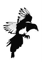 a black and white silhouette of a bird flying