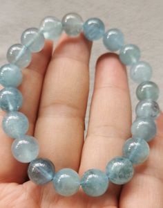 material:natural stone quantity:one strand 8inch=33-16pcs size:approx.6-12mm note:have larger stock and offert wholesale price. Blue Aquamarine Natural Stone Bracelets, Blue Aquamarine Bracelets With Natural Stones, Aquamarine Gemstone Beads Bracelets, Blue Crystal Bracelet With Natural Stones, Aquamarine Gemstone Round Bracelets, Kyanite Bracelet, Aquamarine Bracelet, Raw Crystal Jewelry, Gemstone Bangle