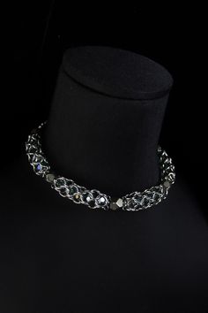 Immerse yourself in the world of unique style with our luxurious choker, meticulously handcrafted. This piece of art is woven from durable steel, exquisite glass beads, pyrite beads . Our choker embodies sophistication and distinctive character, highlighted by its substantial thickness and delicate sparkle. Discover the refinement in every detail of this accessory that adds incomparable charm to your look. Total length of the choker (adjustable) 45 cm / 17.7 inch **PACKAGING** All jewelry comes