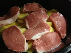 raw meat is being cooked in a slow cooker