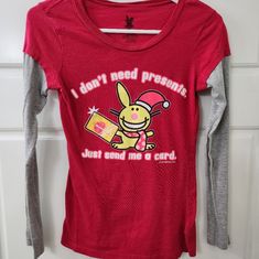 Nwot Red & Gray Bunny Graphic Print Long Sleeve Graphic Bunny Tee Red, Gray & White Bunny Graphic Print On The Front Crew Neckline Long Sleeves Straight Hemline Pullover Styling Tag Says Small But Fits More Like 14 All Offers Are Welcomed! Professional Seller, Smoke-Free Home, And Same Or Next Day Shipping. Like Items For Price Drops. Receive A Bundle Discount When You Purchase Two Or More Items. Please Message With Any Questions. New To Poshmark? Sign Up With My Code Alexmcderm And Receive $10 Cute Red Winter Tops, Red Fitted Fun Top, Fitted Fun Red Top, Fun Fitted Red Tops, Cute Red T-shirt For Winter, Cute Red Winter T-shirt, Playful Fitted Red Tops, Playful Red Christmas Tops, Cute Red Long Sleeve Tops