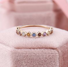 Rainbow Sapphire Eternity Band, Colorful Natural Gemstone Rings, Multi Colored Stone Rings, Stackable Mothers Ring, Birthstone Stacking Ring ✧･ﾟ: *✧･ﾟ:* Welcome to Charles Davin Jewelry*:･ﾟ･ﾟ✧ Moissanite - a gemstone known to bring in luck in someone's life, the user can give off a look of elegance. You can give your special someone luck whilst showing your love to them. ✶Material: 10K/ 14K/ 18K ✶Main Stone: Natural Sapphires and Natural Gemstones ✶Side Stone: - ✶Width of band: 1.3mm ✶Thickness Mothers Ring Stackable, Ombre Rings, Sapphire Eternity Band, Birthstone Stacking Rings, Mothers Ring, Colored Stone Rings, Rainbow Sapphires, Art Deco Diamond Rings, Sapphire Band