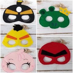 four masks with different designs on them