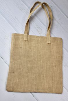 Farmers Market Tote Bag Shown on a natural burlap tote bag Made of NATURAL 100% cotton canvas 22 Inch handles Bag Measures 16.5 x 15.5 inches Flat Tote These totes are perfect for your everyday needs and make a great addition to your daily outings while blending into your home decor and lifestyle! See my other listings here: Eco-friendly Natural Canvas Bag Gift-ready, Rectangular Natural Canvas Bag, Recyclable, Burlap Tote Gift Bag, Rectangular Natural Canvas Bag Recyclable, Beige Burlap Gift Bag, Rectangular Natural Recyclable Canvas Bag, Natural Tote Bag For Grocery, Eco-friendly Natural Bags With Reinforced Handles, Farmers Market Tote Bag