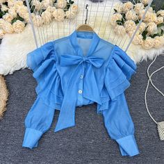 Trendy Party Blouse With Ruffle Hem, Blue Pleated Tops For Summer, Blue Pleated Summer Tops, Puff Sleeve Chiffon Blouse For Party, Spring Party Blouse With Ruffle Sleeves, Chiffon Puff Sleeve Blouse For Party, Blue Fall Party Blouse, Solid Color Shirt For Spring Party, Fitted Ruffle Hem Blouse For Party