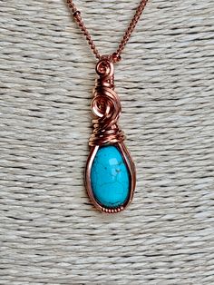 Turquoise and copper is such a beautiful combination, each color enhancing the other. This small, but boldly colored pendant shows off the copper/turquoise combo perfectly. This 10x14 natural turquoise oval cabochon is hand wrapped with bare copper wire. The pendant measures 1 3/8 inches in length (top of bail to bottom) and nearly 1/2 inch in width at the widest point of the pendant. Base wire is 20 gauge square wire and the smaller wrapping wire is 22 gauge half round wire. The pendant comes w Handmade Turquoise Copper Wire Necklace, Handmade Turquoise Necklace With Copper Wire, Turquoise Necklace With Copper Wire, Spiritual Electroformed Turquoise Jewelry, Turquoise Wire Wrapped Pendant Necklace, Handmade Copper Turquoise Jewelry, Handmade Copper Turquoise Necklace As Gift, Unique Turquoise Copper Necklaces, Handmade Copper Jewelry In Turquoise