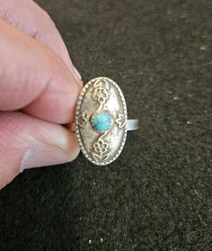 Gorgeous Sterling Silver Ring with Southwestern flair. There is a 4MM matrix Turquoise bezel set on top. Size 7.5 Bohemian Turquoise Jewelry With Concho, Bohemian Turquoise Concho Jewelry, Southwestern Silver Turquoise Ring For Jewelry Making, Adjustable Southwestern Turquoise Ring Nickel-free, Adjustable Southwestern Turquoise Ring Nickel Free, Adjustable Southwestern Style Turquoise Ring Nickel Free, Southwestern Concho Ring Jewelry, Handmade Western Style Silver Turquoise Ring, Bohemian Sterling Silver Turquoise Ring Nickel Free