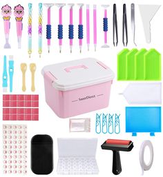 the contents of a pink and white tool box